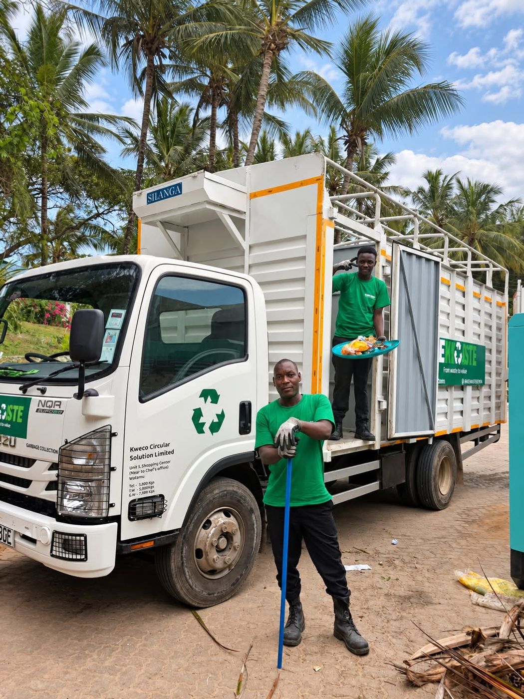 KEWASTE crew next to their truck under the palms